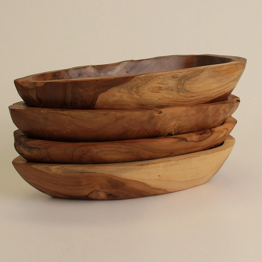 Stack of hand-carved teak wood bowls – natural rustic accent for home décor or serving